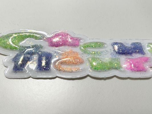 Duurzaam Custom Sparkling Pink Yellow TPU Patch Puffy Labels Op maat voor kleding