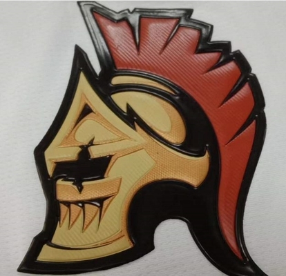 De Overdrachtetiketten die van de sportkledingshitte 3D Plastic Gouden Embleem van TPU drukken